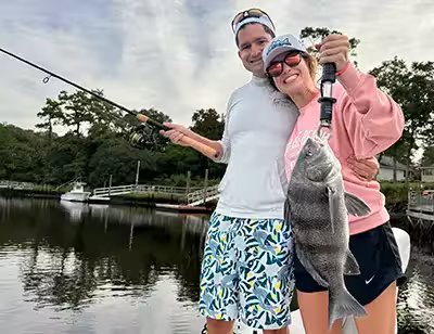 Charter fishing customer with Black Drum