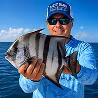 Captain Harvey Wall with a Spadefish on a Captain’s Choice Fishing Charter in Ocean Isle Beach NC