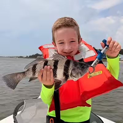 Kids fishing charter with Salty Dawg Fishing Charters in Ocean Isle Beach NC