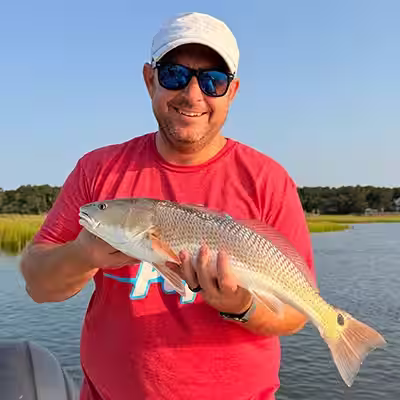 Redfish caught while fishing charter with Salty Dawg Fishing Charters in Ocean Isle Beach NC